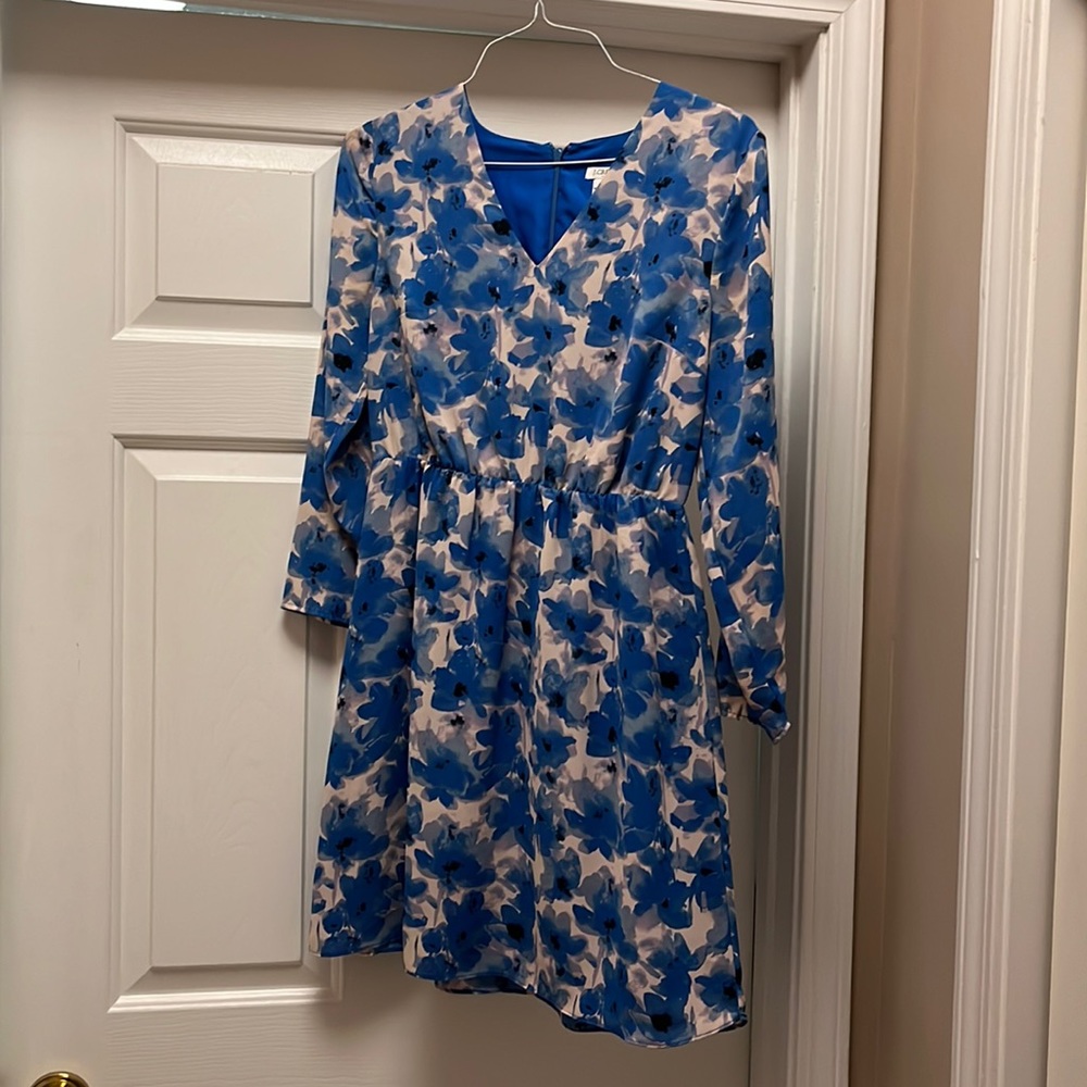 Blue floral dress with long sleeves.